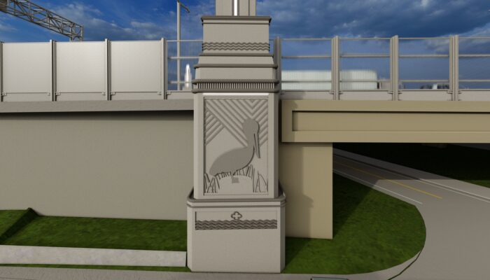 view of art deco pelican art on base of tower of City Park Lake bridge